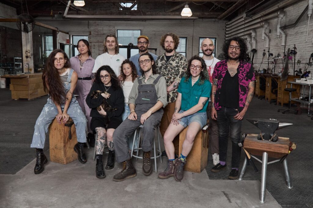 A group portrait of the crafters at Studebaker Metals.