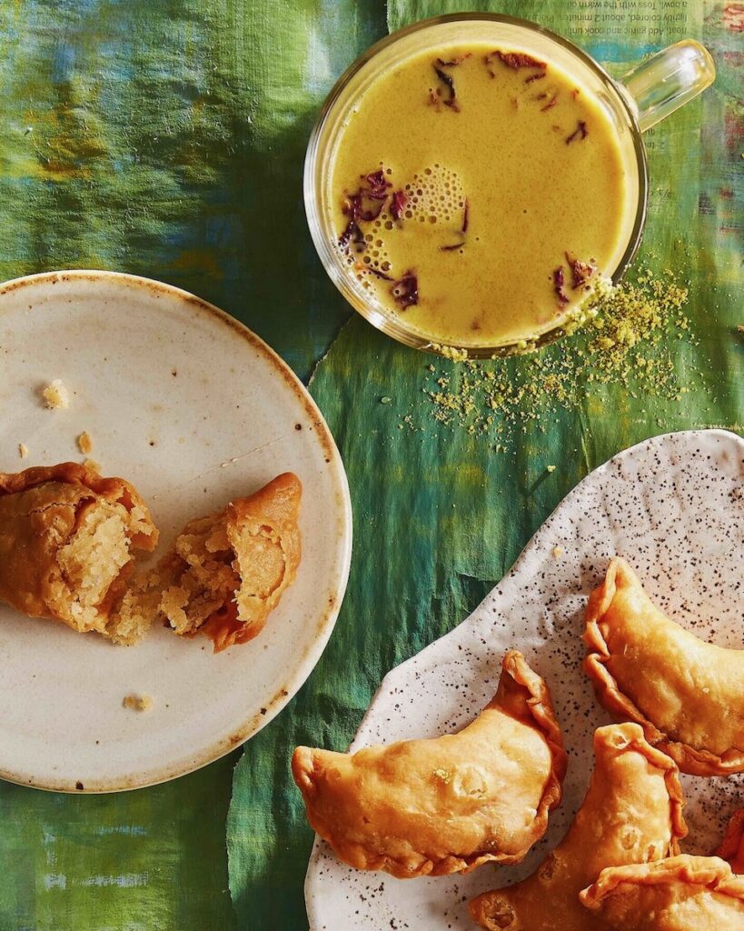 Thandai staged with gujiyas, a sweet Indian treat for Holi