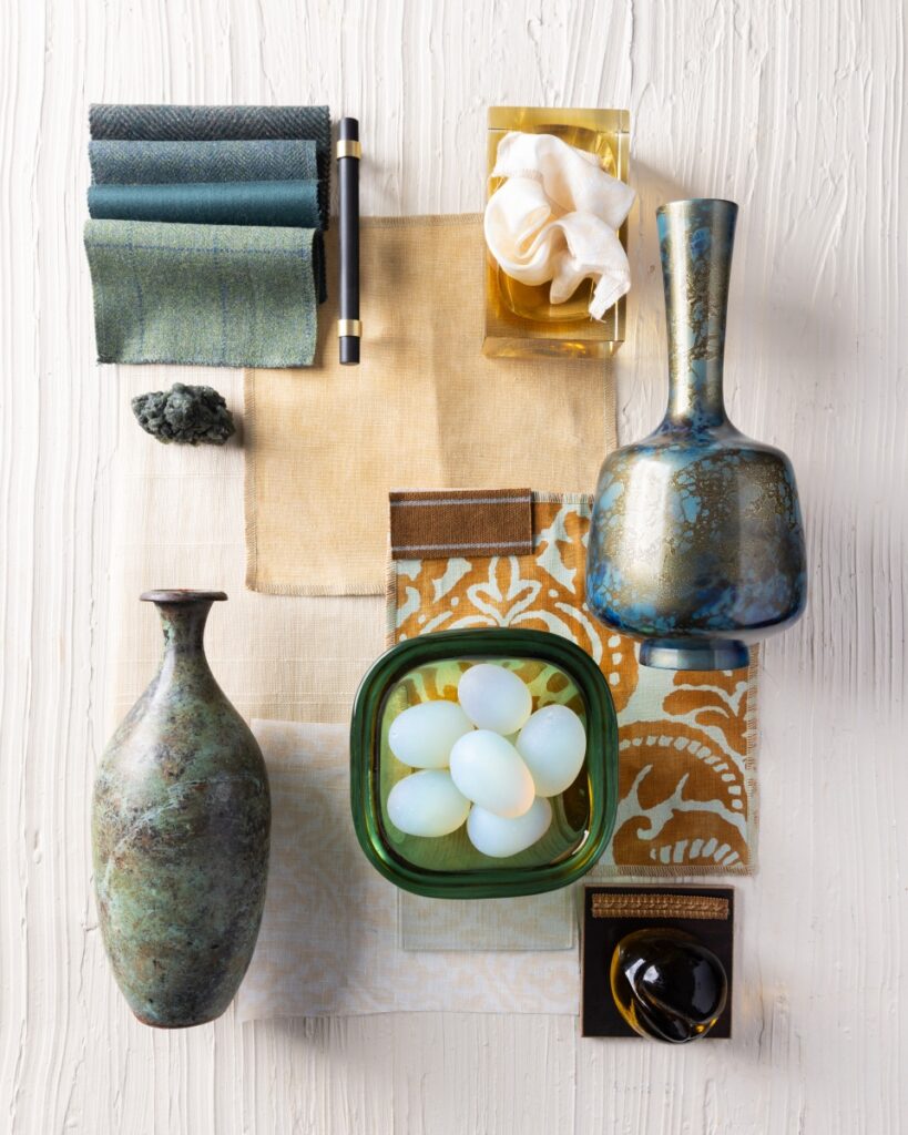 Interior design mood board by James Mohn featuring Holland and Sherry tweeds, Le Gracieux printed cottons, verdigris bronze vases, and Samuel and Sons trims for a Norman chateau-style renovation.