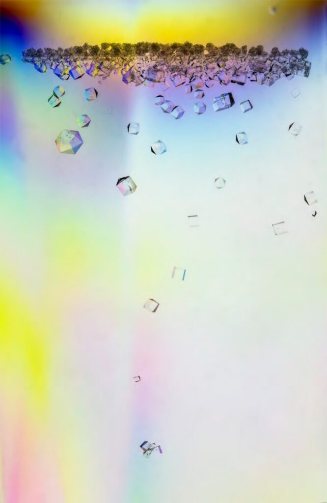 An abstract, macro-photograph featuring translucent crystalline structures suspended against a vibrant, multi-colored pastel background.