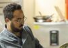 412 Food Rescue is Turning Pittsburgh’s NFL Draft Food Waste Into Community Care A man in a blue chef coat dumping pasta from a strainer into a pot.