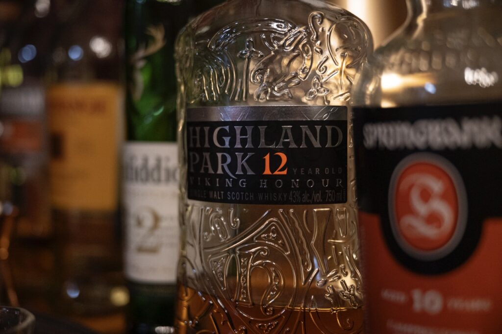 Bottles of Scotch on a counter.