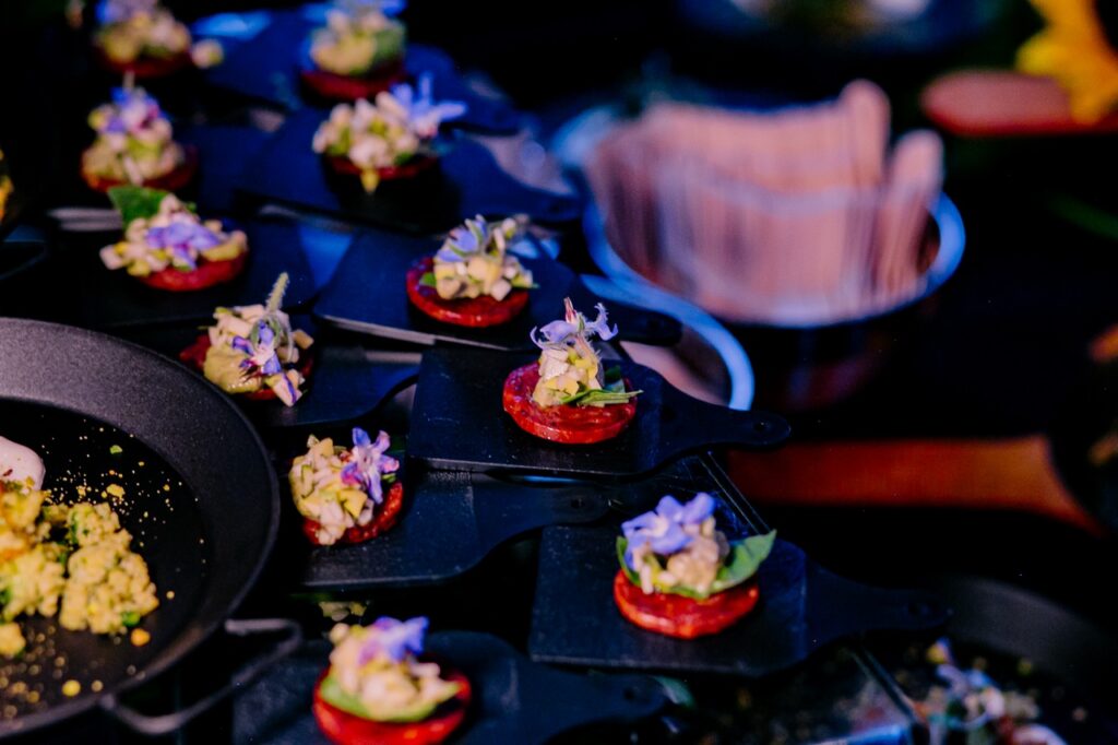 Small plates of appetizer samples on a table.