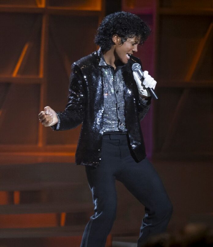 Jaafar Jackson as Michael Jackson in Michael. Photo Credit: Bruce Talamon Michael Jackson in the Michael movie performing on stage.