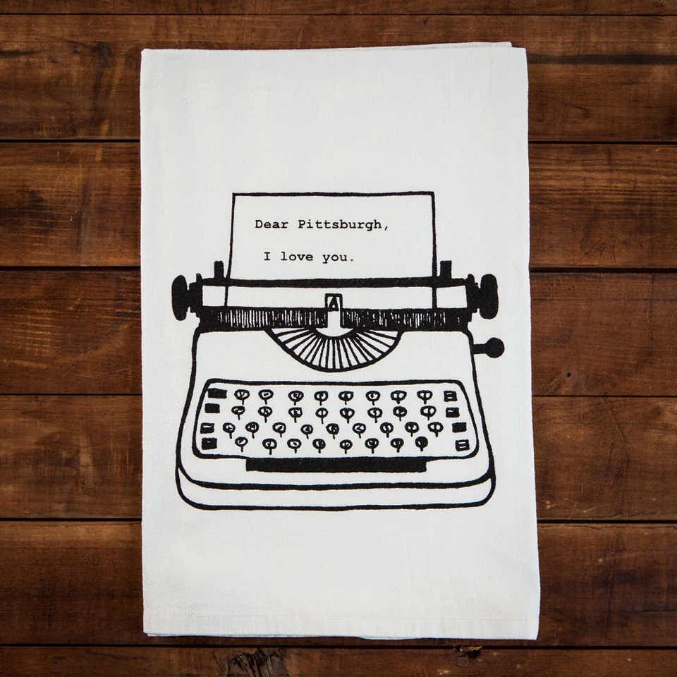 A white towel with a printed typewriter on it that says "Dear Pittsburgh, I Love You"