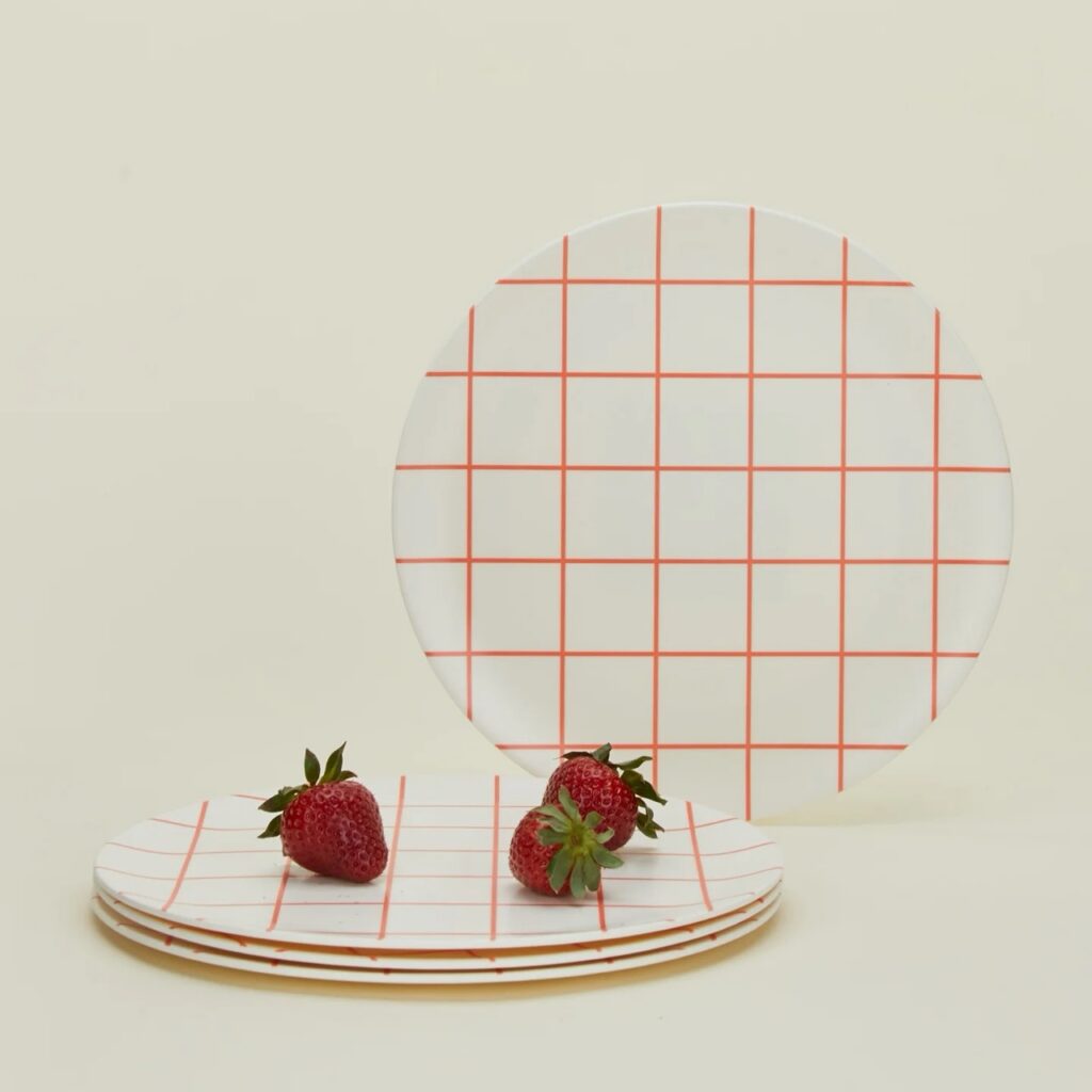 A white plate with a red grid pattern.