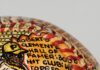 Hot Tickets in Pittsburgh With Sean Collier: June 8-14 A Roberto Clemente baseball with a painting of him on it and writing about him.