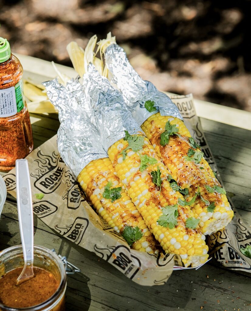 Elote with cilantro on it.