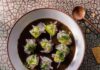 Pittsburgh’s Latin and Caribbean Restaurants Bringing Flavor to the Table A bowl full of habanero aguachile with fluke fish and green garnishes beside a bowl of corn tortillas.