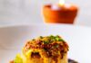 Pittsburgh Vegan Restaurant Week Returns May 11-17 A vegan restaurant week dish featuring a potato stack with vegan melted cheese and other garnishes.