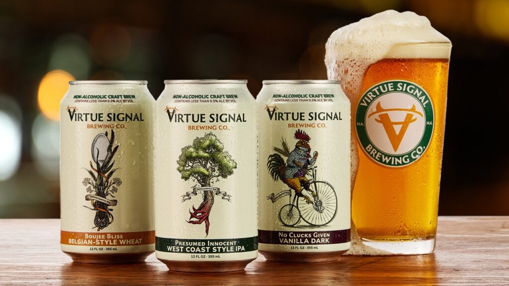 Three cans of NA Virtue Signal Brewing beer beside a glass of beer with foam spilling over the top.