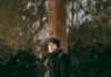 This Month in Pittsburgh: Alternative Takes on Shakespeare Classics From Hamlet to Macbeth A man walks through snow in a winter jacket and hat and gloves in a graveyard.