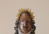 A Summer Full of Art Exhibits in Pittsburgh A bronze statue head with a pointy crown and bulbs for hair.