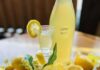 Pittsburgh Events: Your Guide to June 15-21 A bottle of Limoncello beside a table full of lemons and white flowers.
