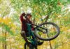 Best Places to Mountain Bike Around Pittsburgh A man jumps through the air on a mountain bike.