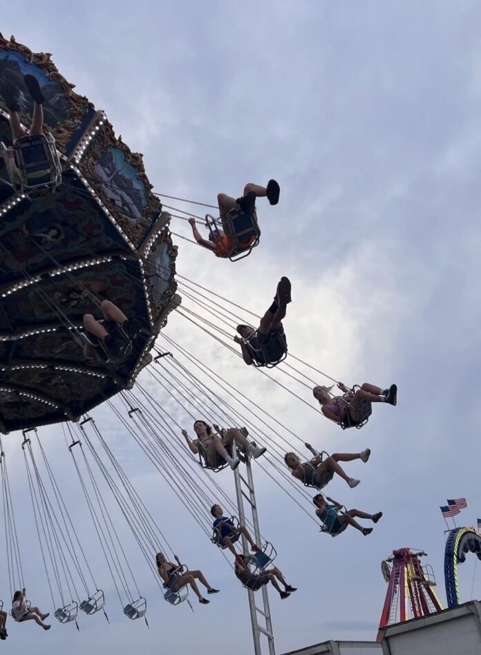 Big Butler Fair TABLE Magazine 4 The Big Butler Fair swing ride, swinging people up into the sky.