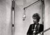 Bob Dylan at Stage AE: What to Know Before You Go Bob Dylan playing his guitar in the recording studio back in the day.