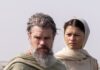 Collier’s Cuts: After a Few Thousand Years of Anticipation, Christopher Nolan’s ‘The Odyssey’ Arrives in Theaters Matt Damon in The Odyssey stands in long cloths with a grey beard and hair as Zendaya stands behind him in long white cloths and scarves.