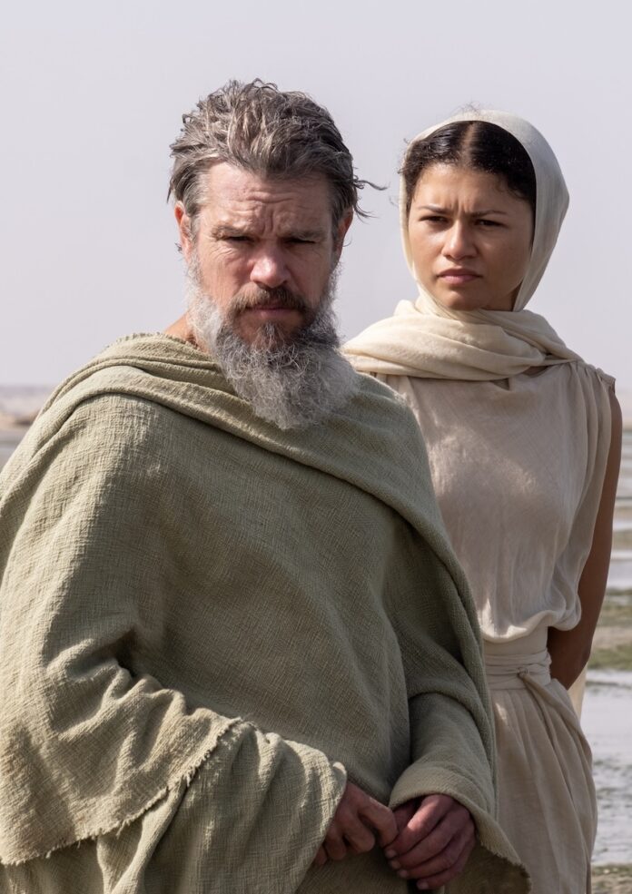 Collier’s Cuts: After a Few Thousand Years of Anticipation, 'The Odyssey' Arrives in Theaters Matt Damon in The Odyssey stands in long cloths with a grey beard and hair as Zendaya stands behind him in long white cloths and scarves.