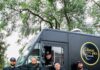 Meet the Team Behind Common Plea Catering’s Unforgettable Event Services: Head of the Table, July 2026 The Common Plea Catering culinary team stands with four members in black outside the catering truck and one member in the drivers seat of the truck.