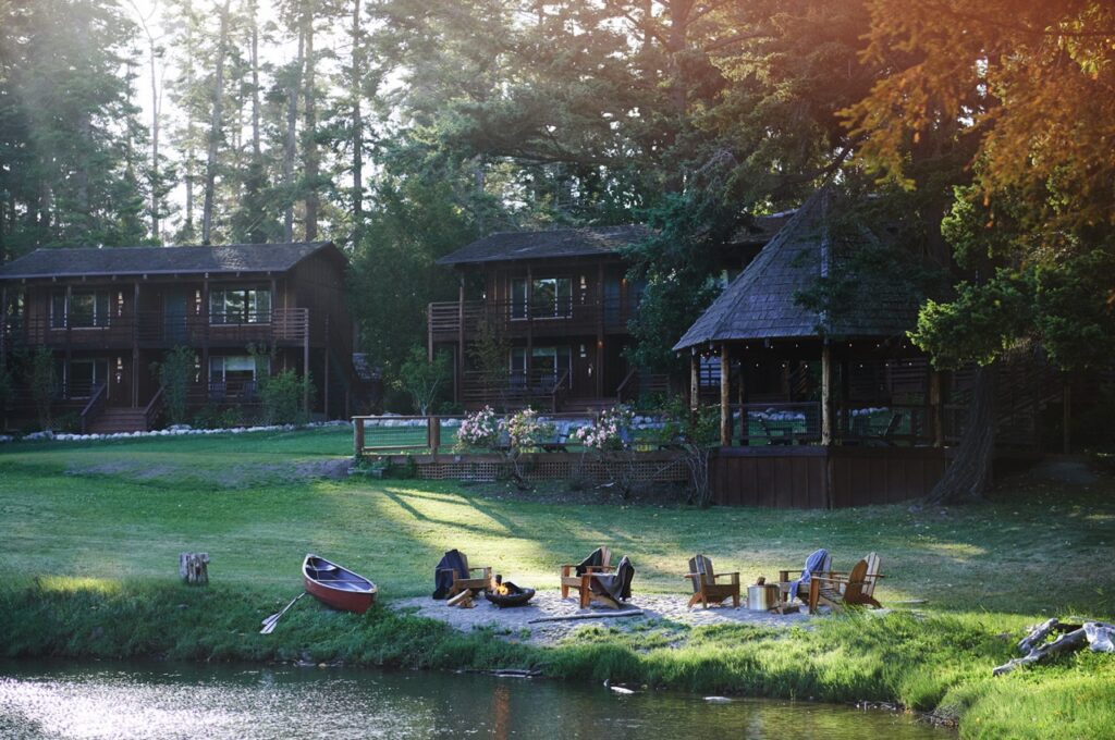 People exercise outside by a lake.