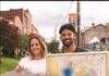 How To Pittsburgh This Weekend A man and woman hold different art pieces in their hands on the sidewalks of Lawrenceville.