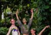 La Fleur at Phipps 2026 From Pittsburgh Earth Day and The Green Voice Three dancers pose in floral and greenery outfits.