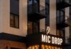 Mic Drop to Bring Band Karaoke and Live Music to Pittsburgh’s North Shore The outside of Mic Drop in Pittsburgh's North Shore with a mic on the marquee and lights below it.