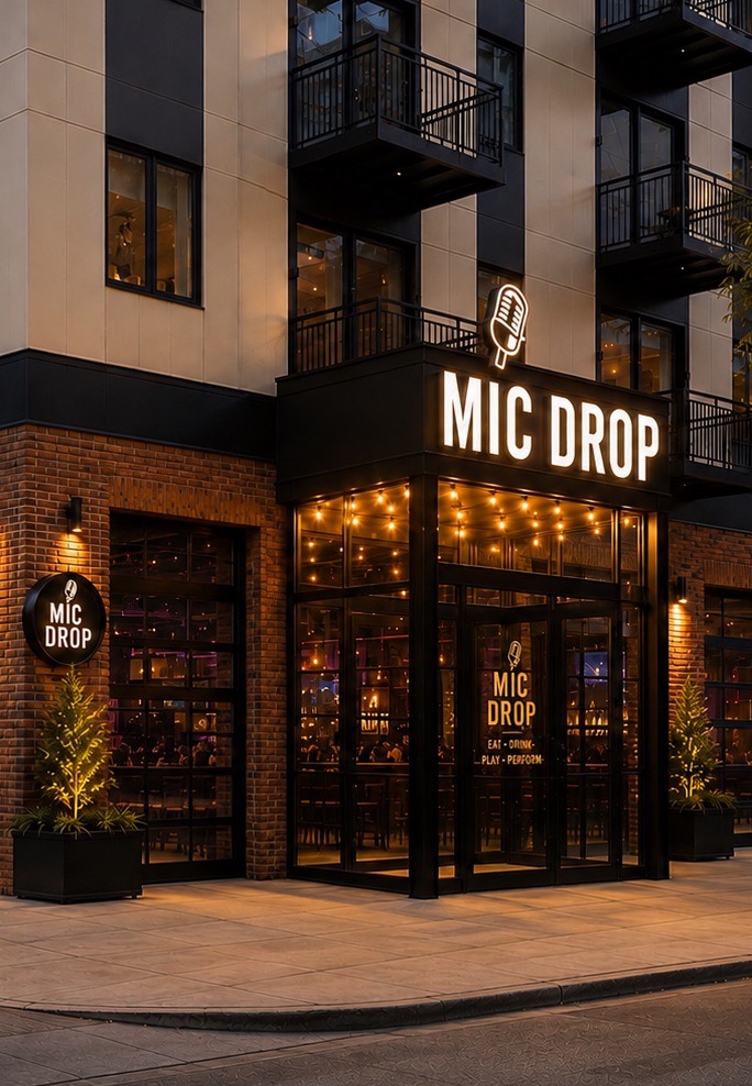 Mic Drop Pittsburgh TABLE Magazine The outside of Mic Drop in Pittsburgh's North Shore with a mic on the marquee and lights below it.