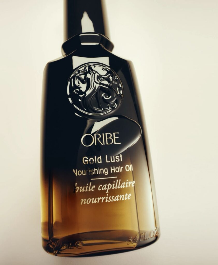 A bottle of Oribe hair oil.