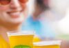 Your Guide to Picklesburgh 2026: What to Eat, See, and Dill Before You Leave Two women hold Picklesburgh beers.