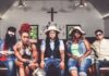 Selecta’s Concert Calendar: The Best Pittsburgh Concerts in July and August 2026 The rap group members of Arrested Development sit in a church pew with a wooden floor beneath them and cross above them.