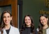 The Wellow’s Physician-led Medical Aesthetics and Wellness Practice in East Liberty: Head of the Table, July 2026 Three medical experts at The Wellow in East Liberty stand in medical jackets.
