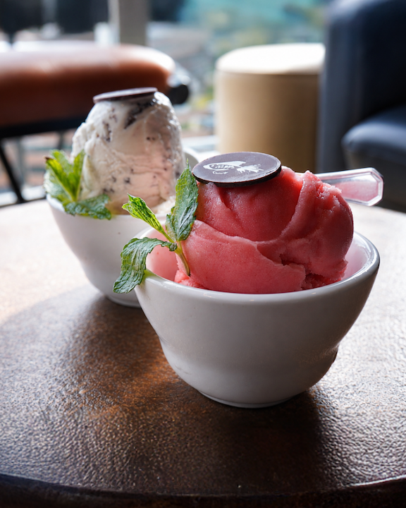 Two white bowls with homemade gelato from Monterey Bay Fish Grotto.
