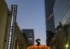 Head Downtown for Halloween Fun, Photo Ops, and Vendors at the Pittsburgh Playhouse’s Fall Fest Giant inflatable pumpkin archway in Pittsburgh, lit for evening events.