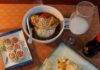 Pittsburgh Restaurant Week 2026: The Menus You Shouldn’t Miss Plates of sushi on a brown table with a wine glass with a milky color drink.