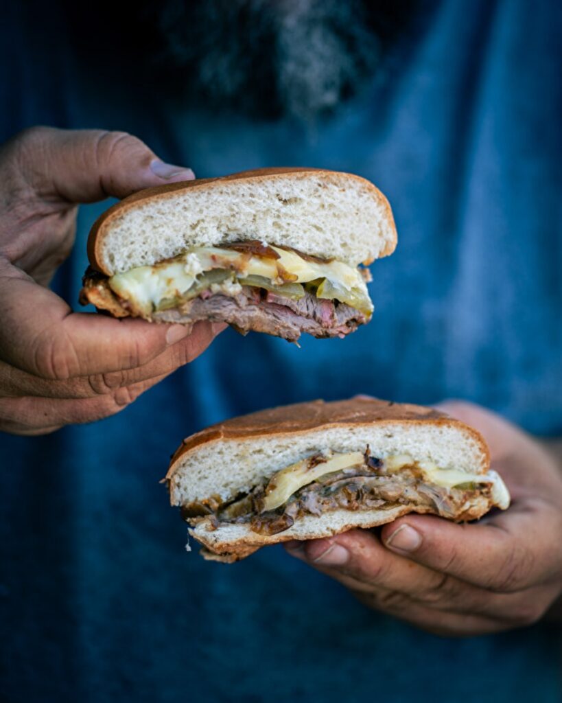 A close-up of a barbecue meat and cheese sandwich from Thierry Cornuet's Bootfire restaurant in Nice.