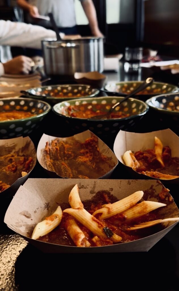 Penne pasta with vodka sauce in serving containers, part of a taste test of Pittsburgh brands.