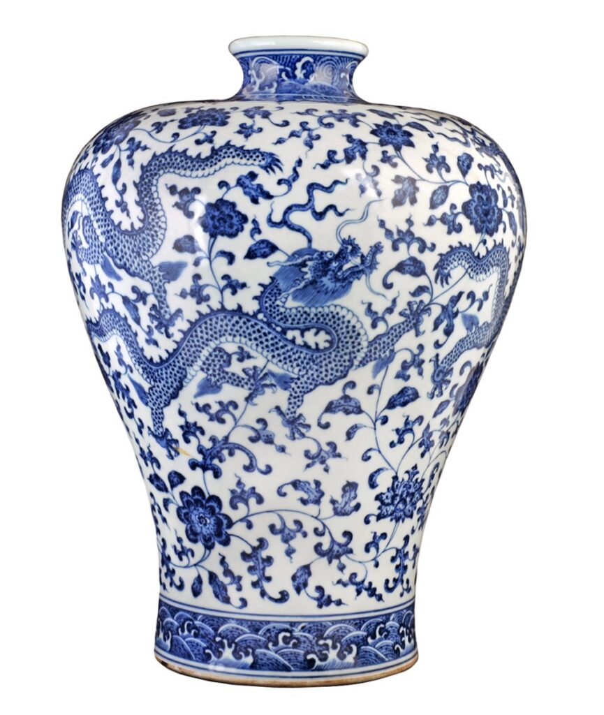 Classic Chinese blue and white porcelain Meiping vase decorated with intricate dragons and lotus flowers.