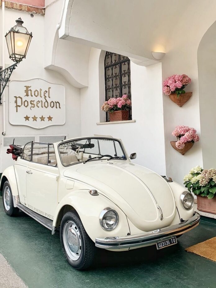 Hotel Poseidon In Positano TABLE Magazine 5 White vintage Volkswagen Beetle parked outside Hotel Poseidon, Positano