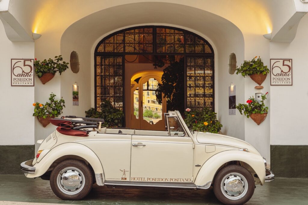 Cream convertible classic car outside Hotel Poseidon Positano