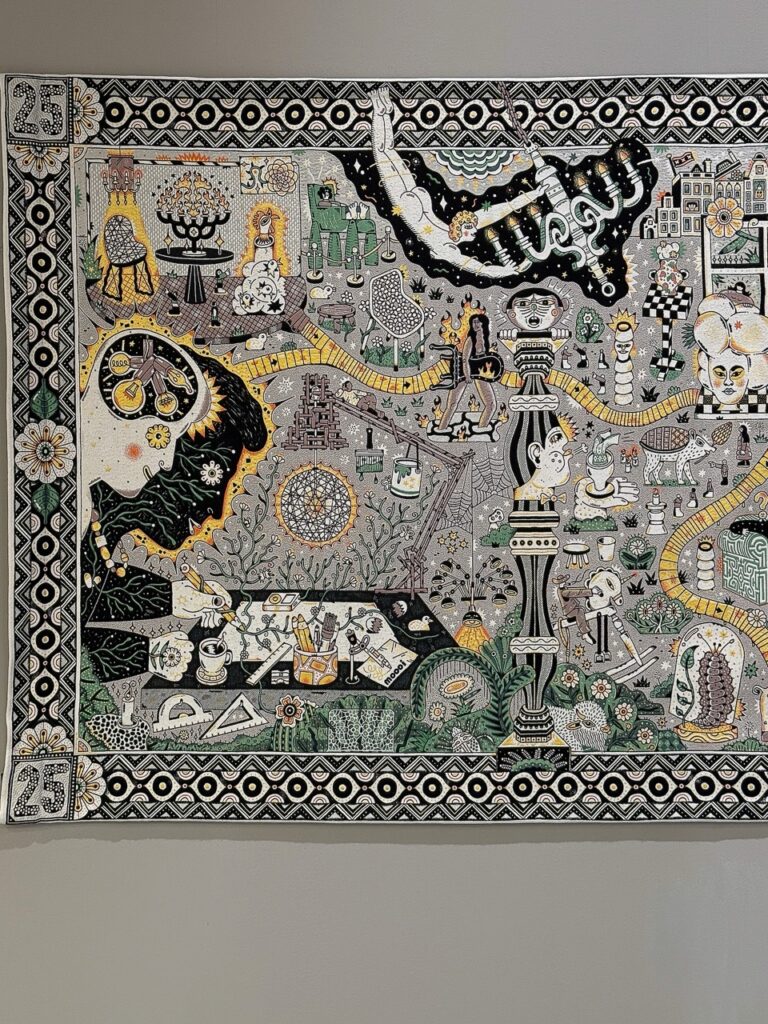 Intricate tapestry with abstract patterns, chess pieces, and surreal figures, reflecting 2027 design trends.