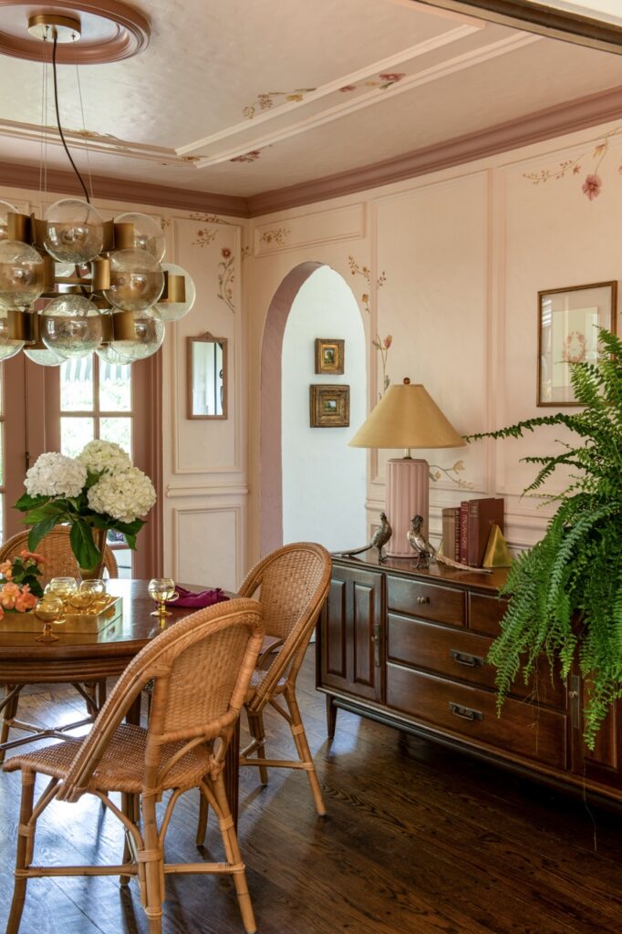 Mt. Lebanon cottage dining room: wicker chairs, floral ceiling, vintage dresser