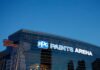 Guide to PPG Paints Arena: Seats, Parking & Nearby Dining PPG Paints Arena exterior at dusk, featuring the arena's name and a hockey statue.