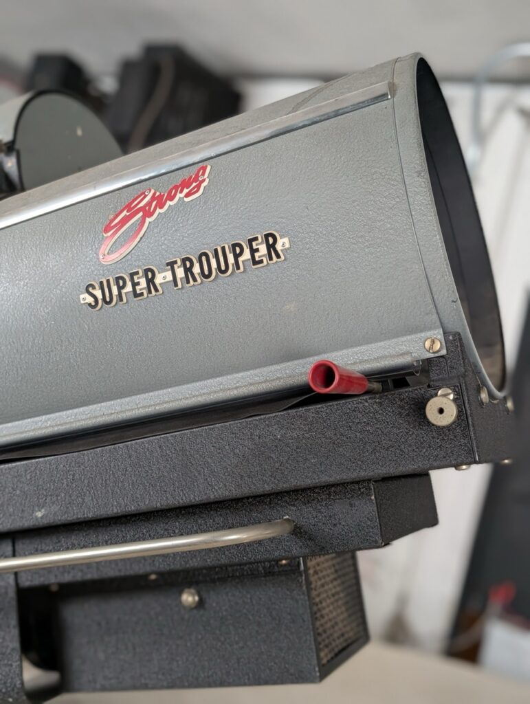Close-up of a vintage Strong Super Trouper spotlight at the Palace Theatre