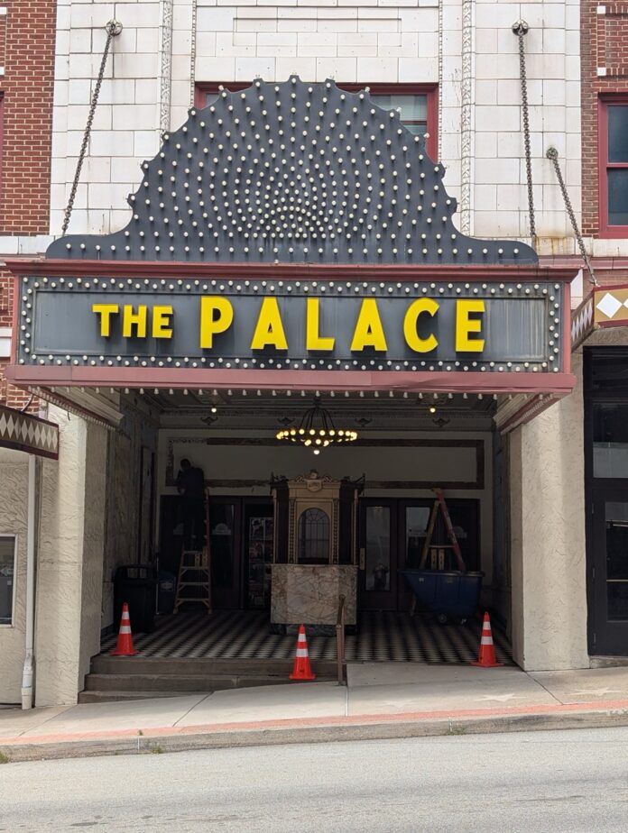 Palace Theatre Anniversary Events TABLE Magazine 6 The Palace Theatre marquee with "THE PALACE" in yellow letters.