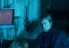 Collier’s Cuts: Robert Pattinson Gets Close to an Oscar in ‘Primetime’ — While Brad Pitt Is Lost in the Woods in ‘Heart of the Beast’ Robert Pattinson in the movie Primetime sitting in blue light behind smeared glass.