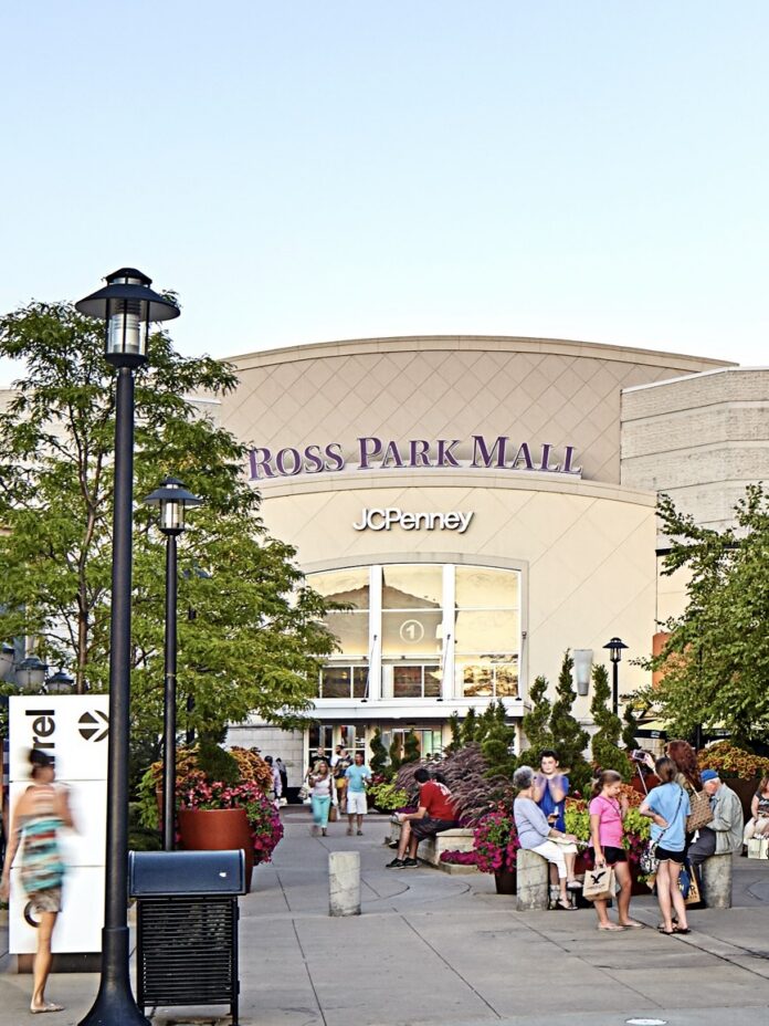 Ross Park Mall entrance with JCPenney and shoppers enjoying the exterior