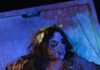 Best Halloween Plays and Musicals in Pittsburgh: The Season’s Spookiest—and Silliest—Shows Zombie actor emerging from a coffin in a Halloween musical performance.