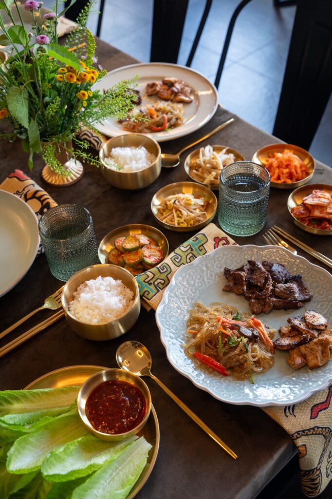 Korean BBQ spread with bulgogi, kimchi, and banchan